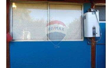 Casa con local comercial