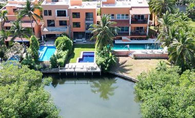 CASA FRENTE A LAGUNA EN CANCUN 4 RECAMARAS COLDWELL BANKER