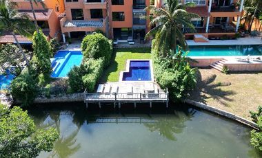 CASA FRENTE A LAGUNA EN CANCUN 4 RECAMARAS COLDWELL BANKER