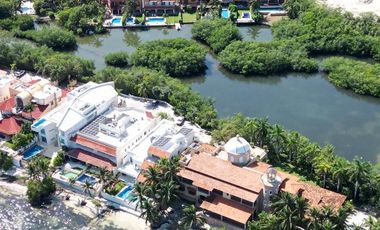 CASA FRENTE A LAGUNA EN CANCUN 4 RECAMARAS COLDWELL BANKER