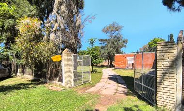 Terreno de 1.600 con quincho y casa en construcción, oportunidad