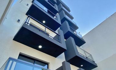 Departamento a estrenar de 2 ambientes con cochera. Edificio con amenities