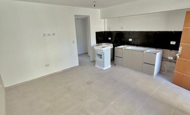 Departamento a estrenar con cochera en edificio con amenities