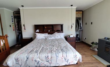 Hermosa parcela con casa en condominio.