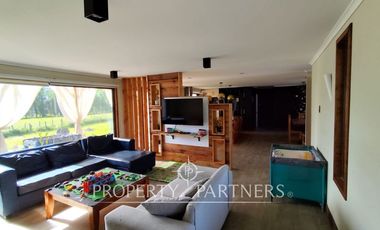 Hermosa parcela con casa en condominio.