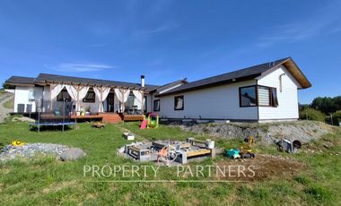 Hermosa parcela con casa en condominio.