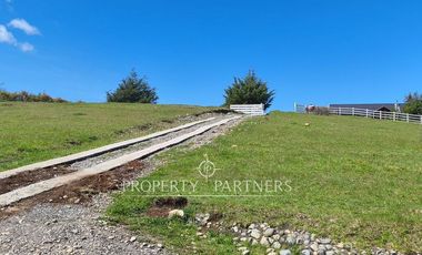 Hermosa parcela con casa en condominio.