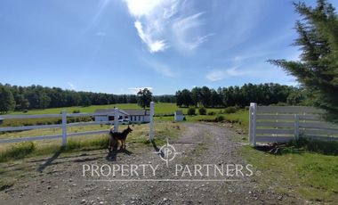Hermosa parcela con casa en condominio.
