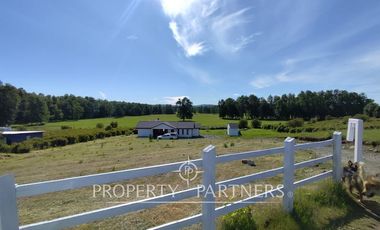 Hermosa parcela con casa en condominio.
