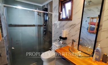 Hermosa parcela con casa en condominio.