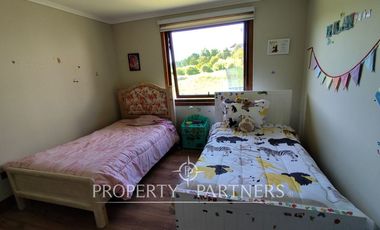 Hermosa parcela con casa en condominio.