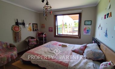 Hermosa parcela con casa en condominio.