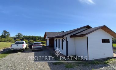 Hermosa parcela con casa en condominio.