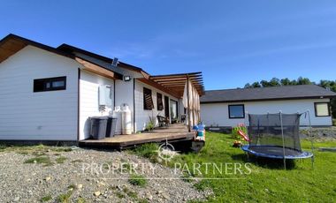 Hermosa parcela con casa en condominio.