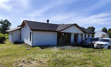 Hermosa parcela con casa en condominio.