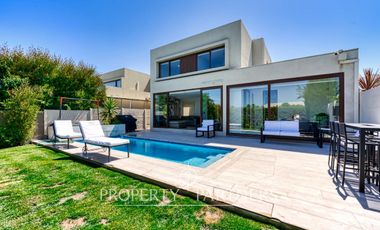 Casa moderna en excelente estado en condominio consolidado de Piedra Roja