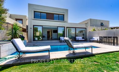 Casa moderna en excelente estado en condominio consolidado de Piedra Roja
