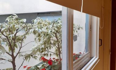 Departamento tipo piso cuatro ambientes con cochera a la venta en Avellaneda Centro