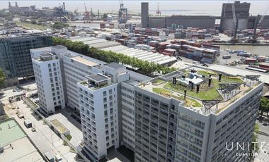 Excelente oportunidad oficina en alquiler con division y cochera en Distrito Quartier.
