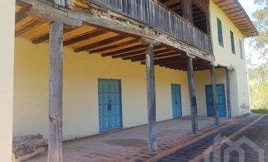 CASA Y TERRENO DE VENTA ZHIDMAD AZUAY