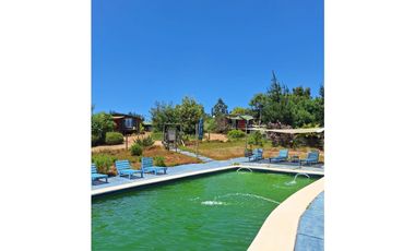 SE VENDE HERMOSA PARCELA CON CABAÑAS PARA INVERSION EN ALGARROBO