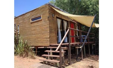 SE VENDE HERMOSA PARCELA CON CABAÑAS PARA INVERSION EN ALGARROBO