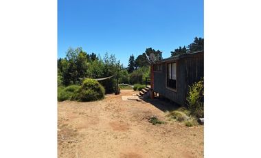 SE VENDE HERMOSA PARCELA CON CABAÑAS PARA INVERSION EN ALGARROBO