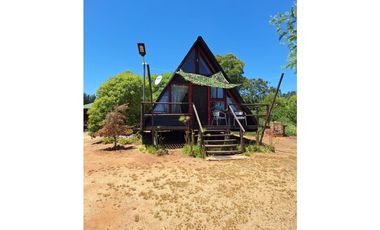 SE VENDE HERMOSA PARCELA CON CABAÑAS PARA INVERSION EN ALGARROBO