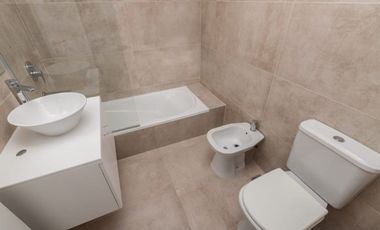 DEPARTAMENTOS EN 2 PLANTAS CON COCHERA Y PARRILLA