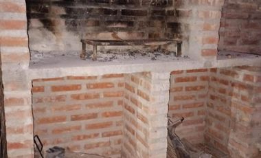 Vende Casa 2 dormitorios en Centenario -Barrio Sarmiento