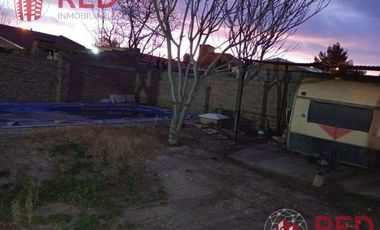 Vende Casa 2 dormitorios en Centenario -Barrio Sarmiento