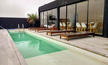 Departamento 3 ambientes edificio nuevo. Cochera. Piso Alto. Piscina, SUM