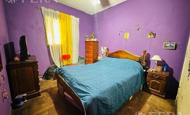 Venta de Casa 4 ambientes con cochera y fondo libre en Quilmes Oeste (31722)