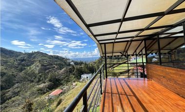 VENTA DE INCREIBLE CABAÑA UBICADA EN GUATAPÉ, CERCA DE LA PIEDRA