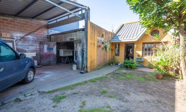Casa con galpón para taller y jardín en Quilmes