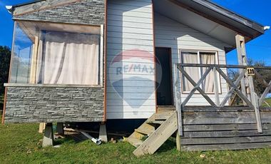 OFERTA VENTA DE CABAÑA CON PARCELA  EN CHILOE