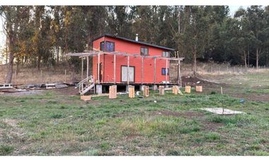 PARCELA DE 6.400 M2  CON CABAÑA