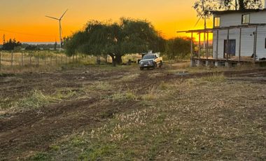 PARCELA DE 6.400 M2  CON CABAÑA