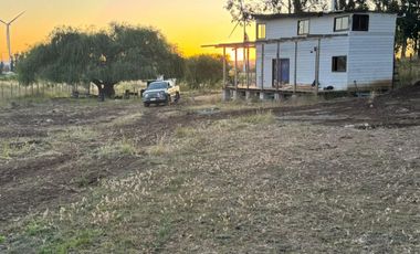 PARCELA DE 6.400 M2  CON CABAÑA