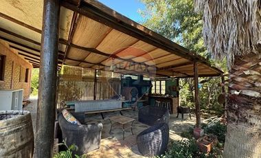 CASA CON PARCELA DE 44 HECTAREAS