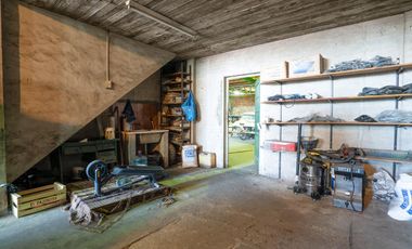 Galpón de 300m2 con dos departamentos de 65m2 c/u en Rotonda de Bajo Boulogne