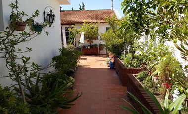 EDIFICIO COMERCIAL CON VIVIENDA, LOCAL Y SALON