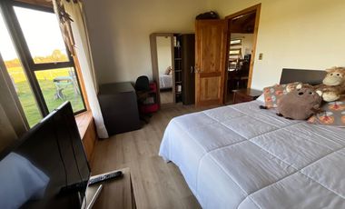 PARCELA CON CASA  PARA VIVIR  3 DORMITORIOS Y 2 BAÑOS
