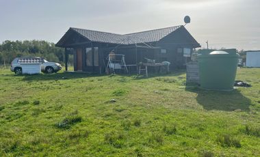 PARCELA CON CASA  PARA VIVIR  3 DORMITORIOS Y 2 BAÑOS