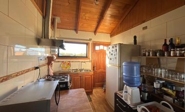 PARCELA CON CASA  PARA VIVIR  3 DORMITORIOS Y 2 BAÑOS