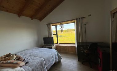 PARCELA CON CASA  PARA VIVIR  3 DORMITORIOS Y 2 BAÑOS