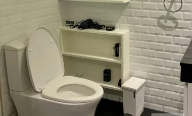 Modern dark-toned condo with glass dining at Royal Castle (AA44283)