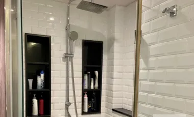 Modern dark-toned condo with glass dining at Royal Castle (AA44283)