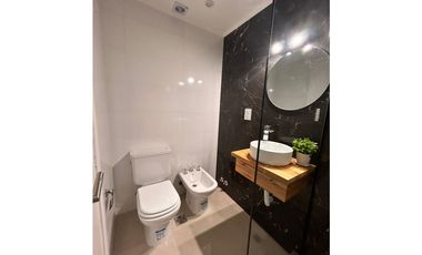 1 ambiente a la calle en el centro de la ciudad