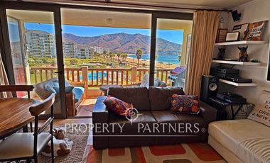 Departamento y piscina temperada frente al mar en Papudo